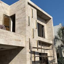 Natural stone elevation cladding on building facade